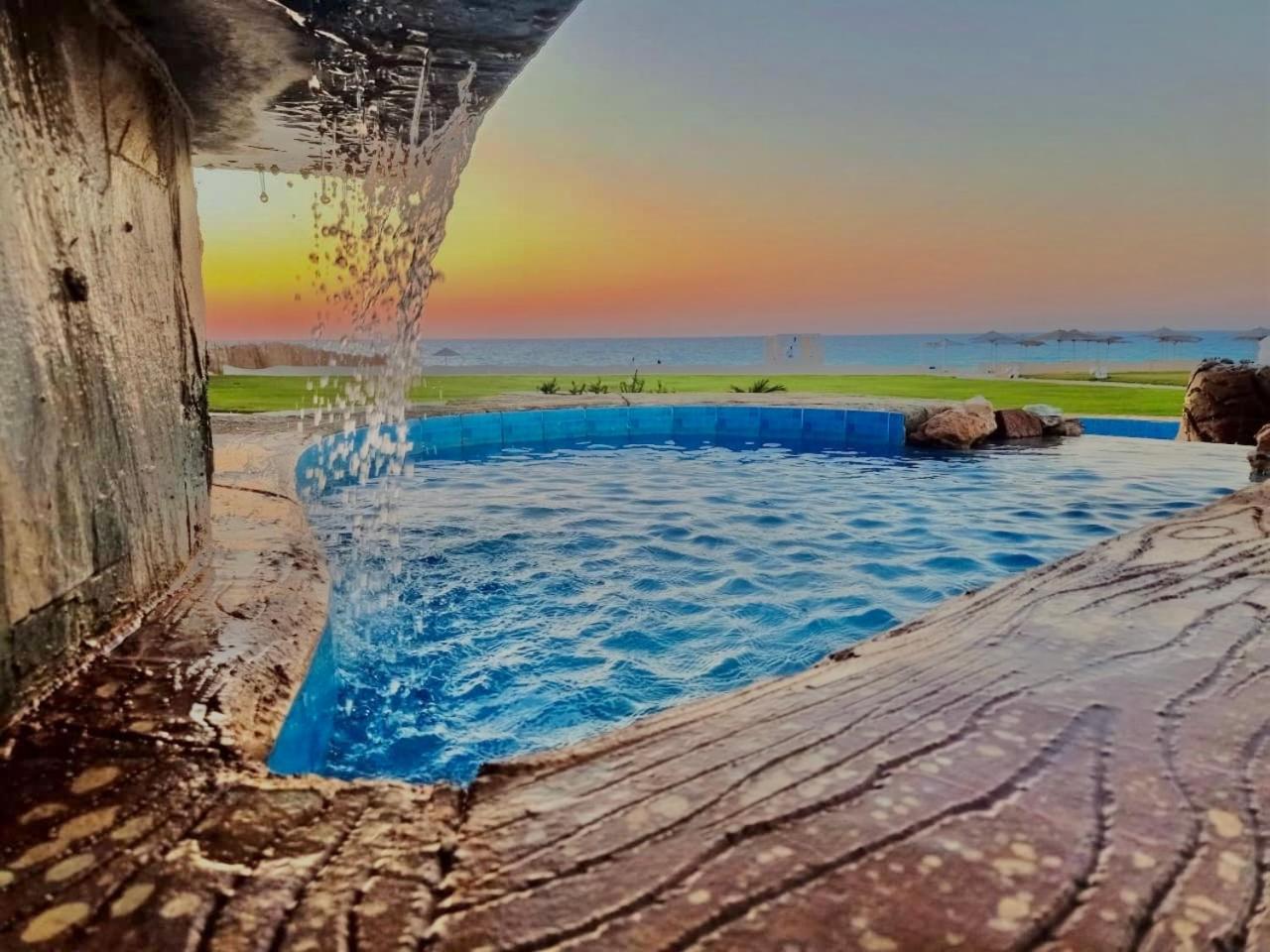 伊砵罗特博格厄尔阿拉巴酒店 伯格埃拉伯 外观 照片 Sunset at the beach